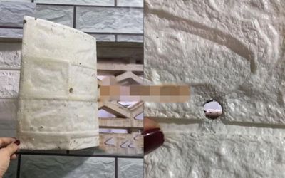 Đi vứt rác, cô gái trẻ tá hỏa phát hiện nguy hiểm rình rập ở phía sau nhà tắm phòng trọ
